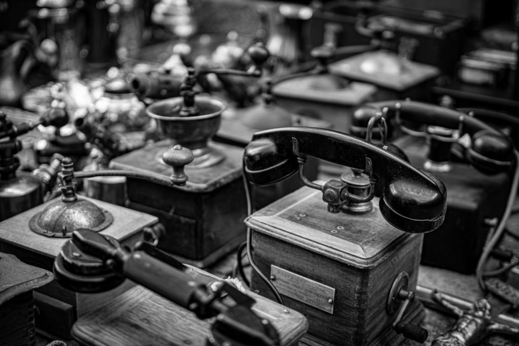 A collection of antique telephones in black and white. Captured in Madrid.