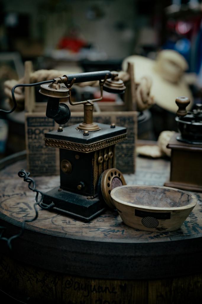 A close-up of a vintage antique telephone with nostalgic decor in Miami.